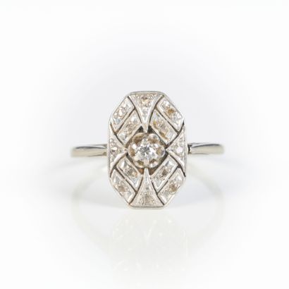 White gold and platinum ring set with small...