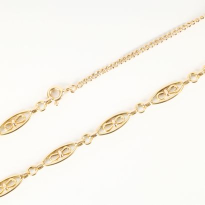 Gold necklace, oval link and curb chain at...