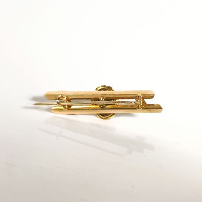 Rose gold brooch featuring a cabochon tiger's...
