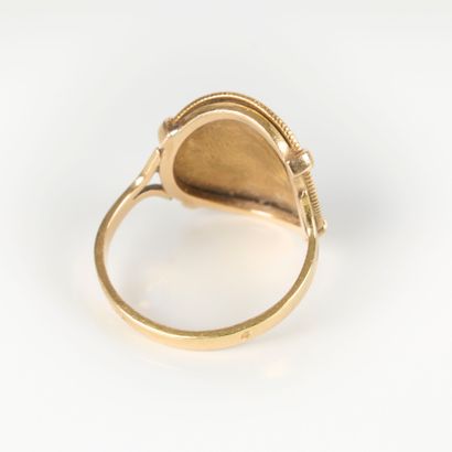 Gold ring set with a 10 FF rooster coin....