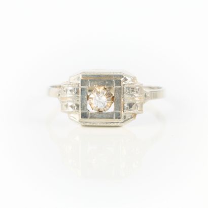 White gold ring set with a small white stone....