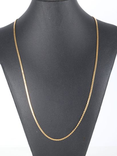 Long necklace in gold (750‰), fancy flat...