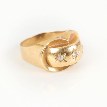 Yellow gold ring decorated with stars inlaid...