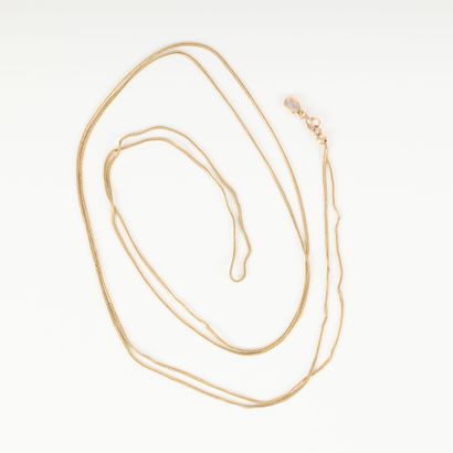 Long necklace in two-tone gold, braided mesh....