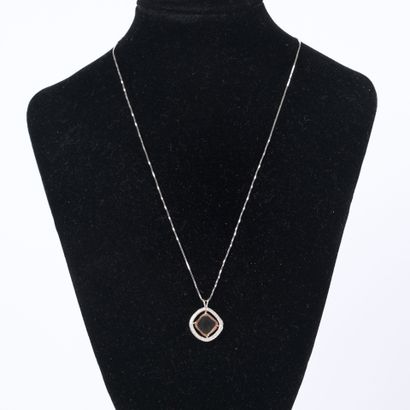 White gold and rose gold pendant centered...