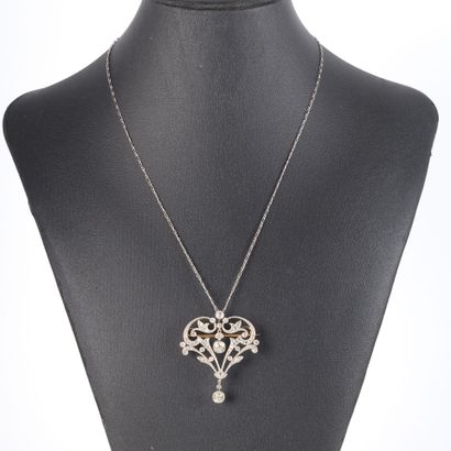 Gold and platinum openwork pendant brooch...