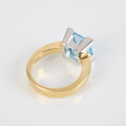 Two-tone gold ring set with a square topaz...