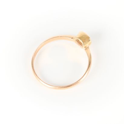Gold ring set with a tooth. TDD 52. 1.41...