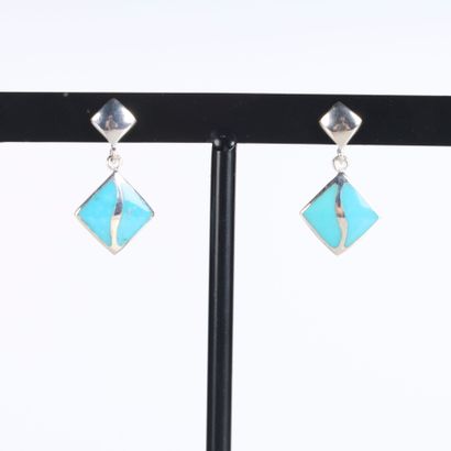 Pair of silver earrings, each decorated with...