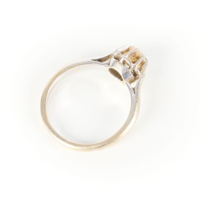 White gold solitaire ring set with a modern...