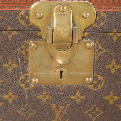 LOUIS VUITTON. Vanity case in Monogram coated...