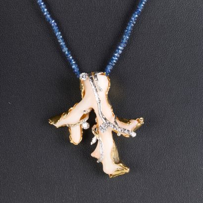 Two-tone gold pendant set with a coral and...