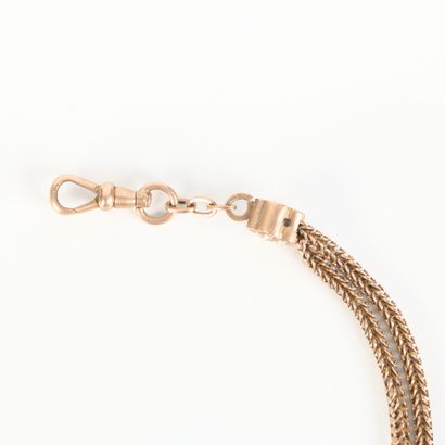 Two-row gold watch chain, motifs set with...