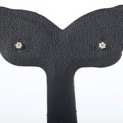 Pair of white gold stud earrings set with...