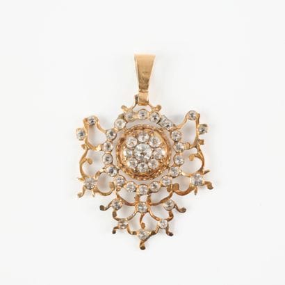 Gold pendant set with white stones (restoration)....