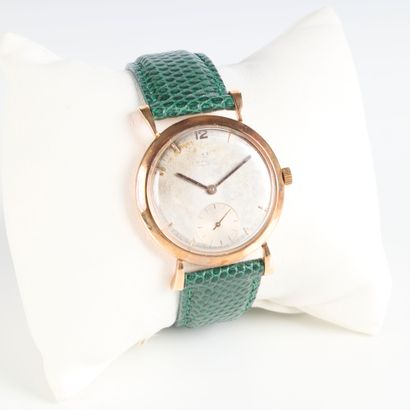 OMEGA. Gold men's wristwatch, plain bezel...
