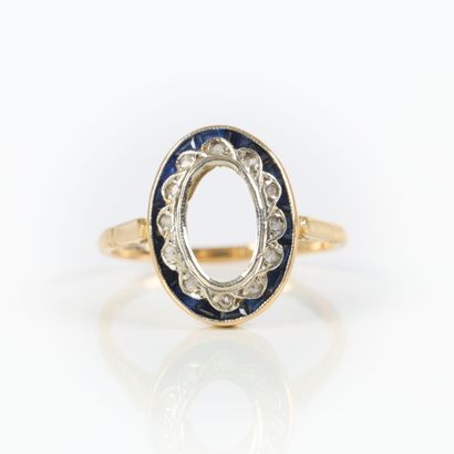 Two-tone gold ring set with small diamonds...