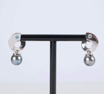 Pair of white gold earrings, each adorned...