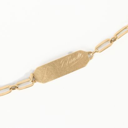 Engraved gold child's curb chain. Accident....