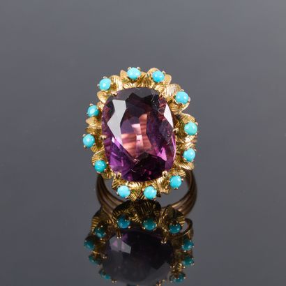 Rose gold ring set with a large amethyst...