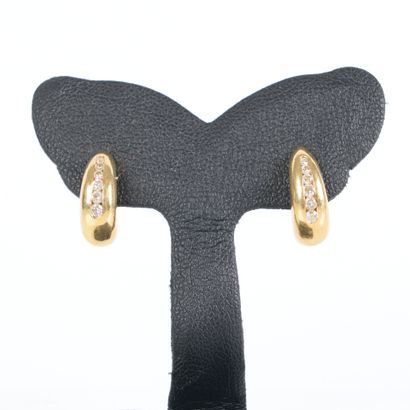 Pair of gold (750‰) earrings, each with 6...