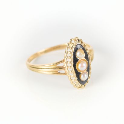 Gold marquise ring set with three half-pearls...