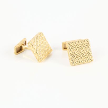 Pair of square gold cufflinks engraved with...