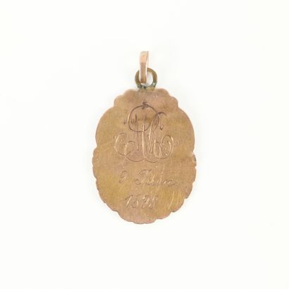 Gold and metal medal decorated with a chalice...
