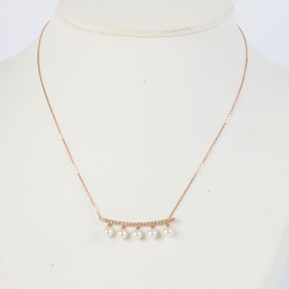 Pink gold necklace (750‰), adorned with a...