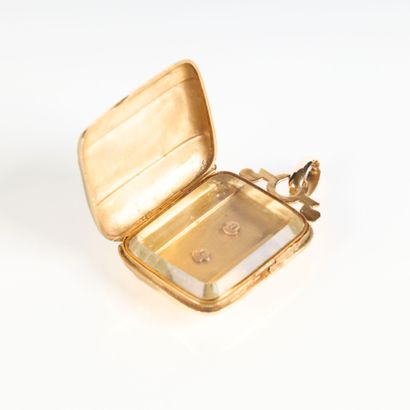 Engraved and numbered gold photo pendant...