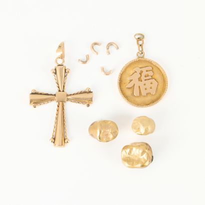 3 gold dental crowns, debris and 2 cross...