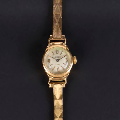 Gold ladies' watch, round dial, flexible...