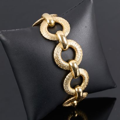 GEORGES LENFANT. Striking gold bracelet featuring...