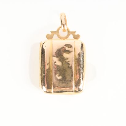 Engraved and numbered gold photo pendant...