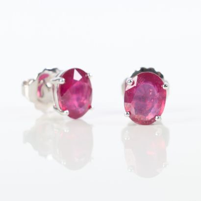 Pair of white gold (750‰) ear studs, each...