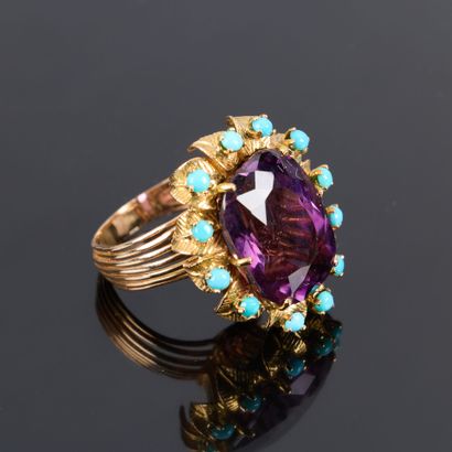 Rose gold ring set with a large amethyst...