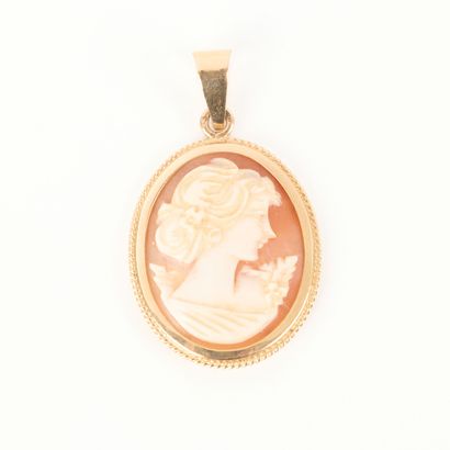 Gold medal set with a shell cameo engraved...
