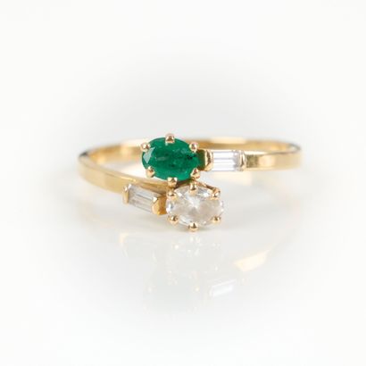 toi et moi (750‰) gold ring, set with an...