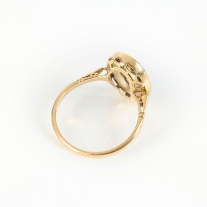 Two-tone gold ring set with small diamonds...