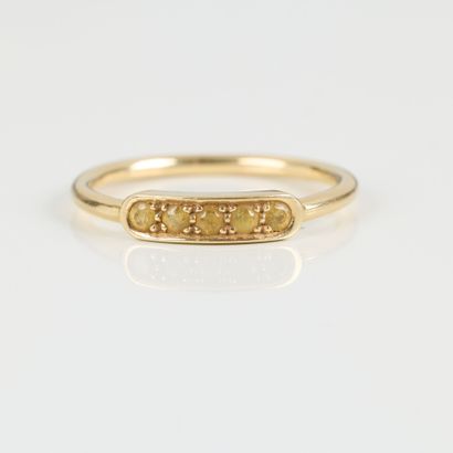 Gold ring set with 5 yellow stones (citrines?)....