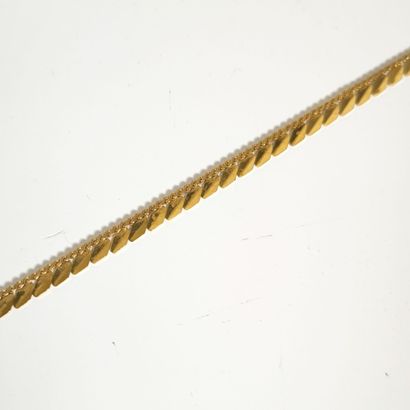 Rose gold necklace featuring an interlaced...