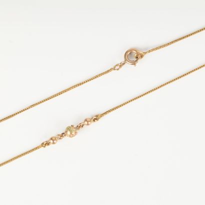 Long necklace in two-tone gold, braided mesh...