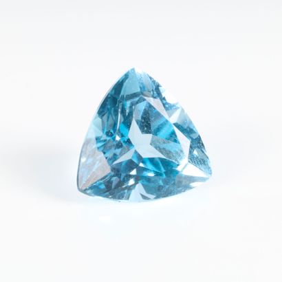 Trillion-cut topaz on paper: weighing approx....