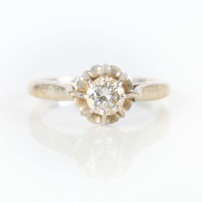 White gold solitaire ring set with a modern...