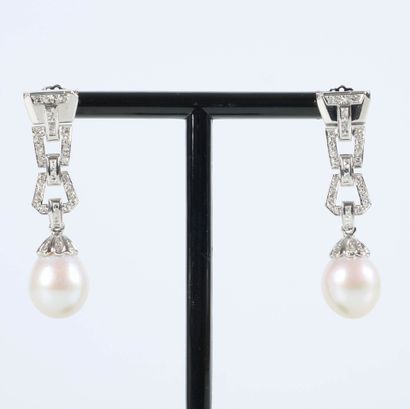 Pair of earrings in white gold and platinum,...