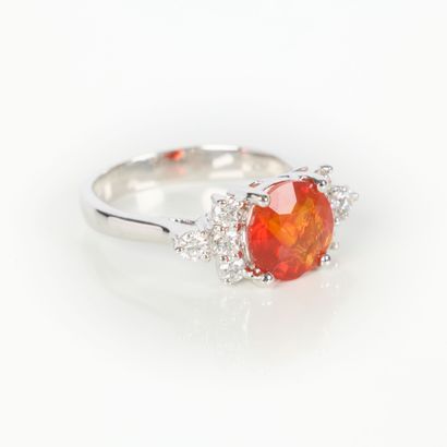 White gold ring (750‰) set with a round fire...