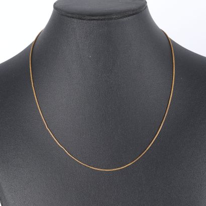 Gold braided chain with 2 rings. 42 cm. 2.12...