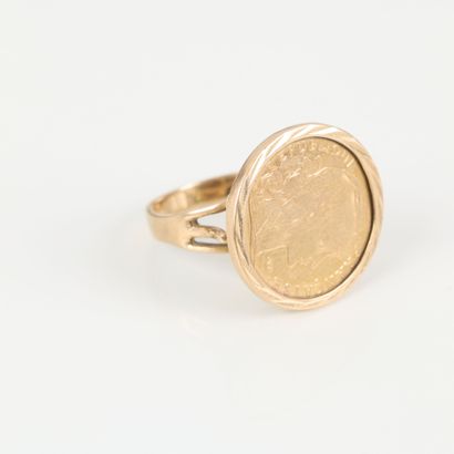 Gold ring set with a gold coin: 10 FF. TDD...