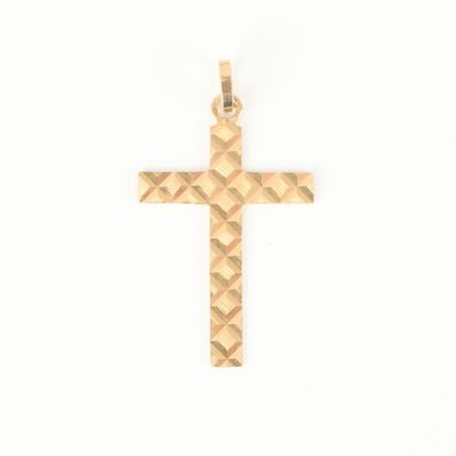 Cross pendant in faceted gold. Height 32...