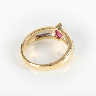 Two-tone gold ring set with a navette ruby...